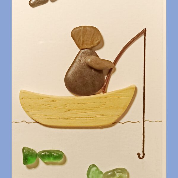 Quadretti realizzati con pietre, legno e vetri di mare