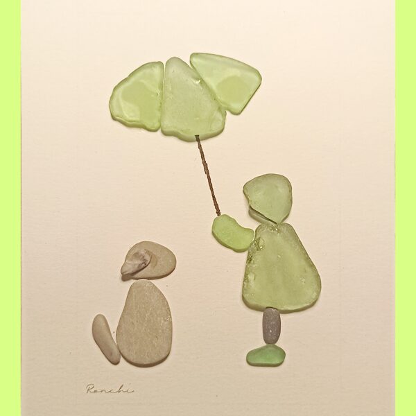 Quadretti realizzati con pietre, legno e vetri di mare